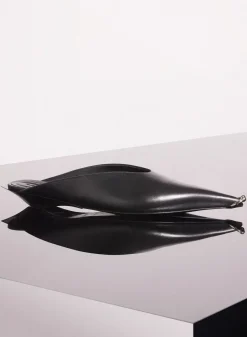 MUGLER black leather piercing fang flat mules