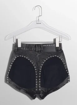 Women MUGLER washed black denim studded shorts
